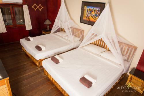 Hotel Joe's Cafe & Garden Resort