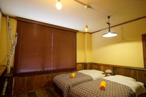 Hostal Hakuba Station Guesthouse En