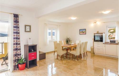 Three-bedroom Apartment In Komarna