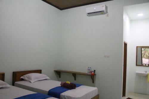 Hostal Arrys Watukarung Surfcamp