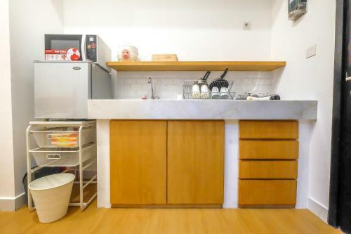 Modern Minimalist Studio Casa de Parco Apartment By Travelio