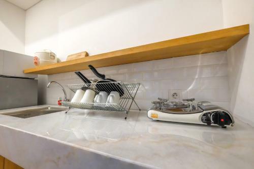 Modern Minimalist Studio Casa de Parco Apartment By Travelio