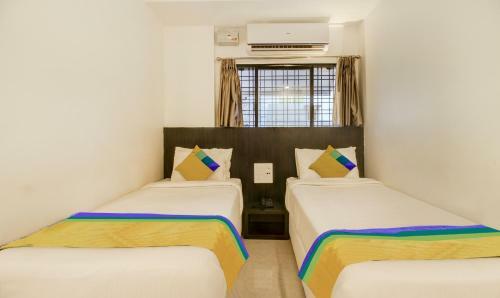 Treebo Trip Hotel Coral