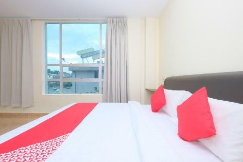 Hostal Oyo 89493 Q Hotel