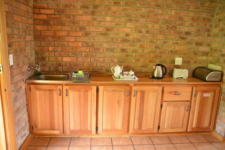 Posada Thaba Tsweni Lodge And Safaris