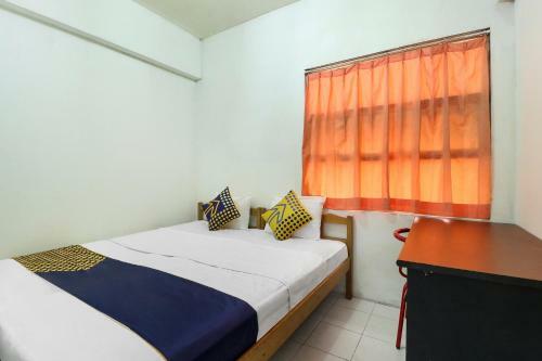 Hotel Spot On 90894 Icarus Home Syariah