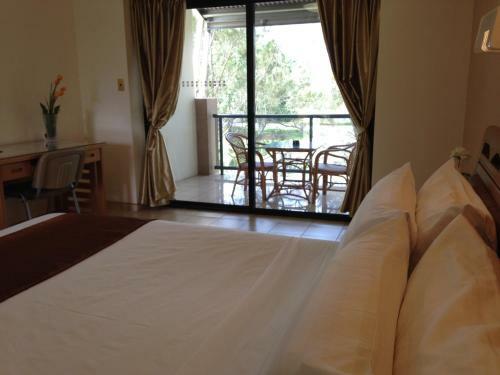 Novena Palms Motel
