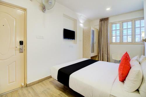 Capital O 77459 Smile Hotels