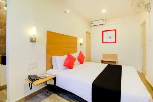 Capital O 77459 Smile Hotels