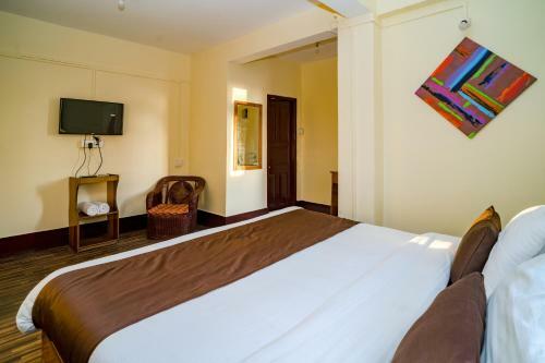Hotel Magpie Mall Road Residency (Mg Marg)