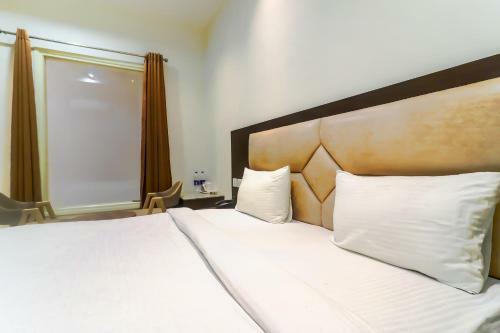 Fabhotel Nido Residency - Fully Vaccinated Staff