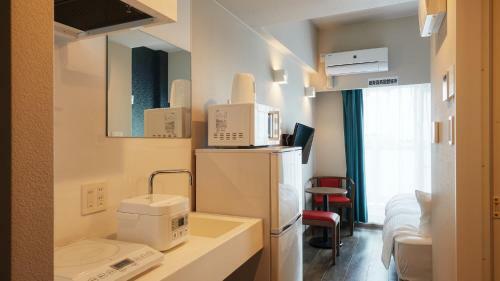 Hotel New Normal Condo In Naha Airport