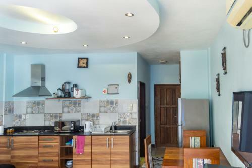 Apartamento Cowrie Beach Haven Studio