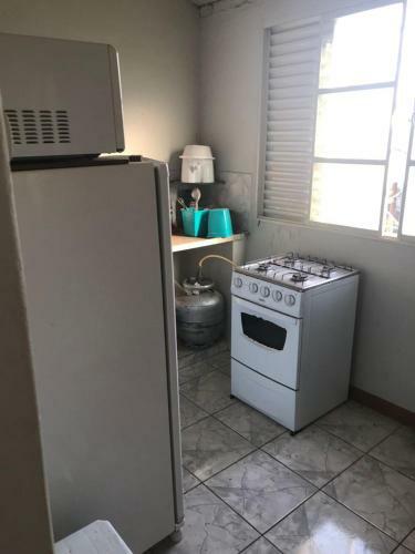 Casa Branca Com Estacionamento - Melhorturistar