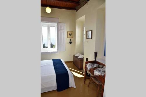 Traditional Cycladic House With View In Andros
