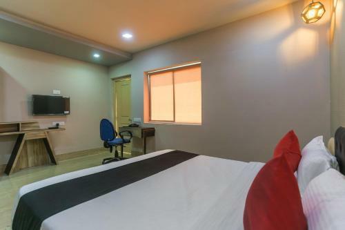 Hotel Capital O 48989 Mr House