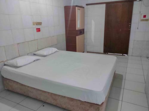 Hostal Paviliun Bu Sinta Redpartner