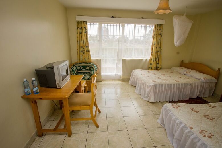 Harlequin Suites Hotel