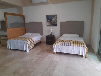 Hotel Suites Aeropuerto 24/7